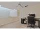Bedroom with a desk, closet, ceiling fan, and a window view to the level below at 711 S Oregon Ave, Tampa, FL 33606