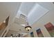 Grand foyer showcasing soaring ceilings, a modern chandelier, and a balcony overlook at 711 S Oregon Ave, Tampa, FL 33606