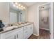 Bathroom featuring double sinks and a granite countertop at 712 Hazy Meadow Ct, Brandon, FL 33510