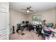 This room features a ceiling fan, neutral walls, a window, and beige carpet flooring at 712 Hazy Meadow Ct, Brandon, FL 33510