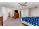 Bedroom featuring a ceiling fan and ensuite bathroom at 712 Hazy Meadow Ct, Brandon, FL 33510
