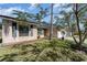 A close up of the charming single-story home featuring a well-manicured lawn at 712 Hazy Meadow Ct, Brandon, FL 33510