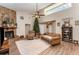 Bright living room with vaulted ceilings, fireplace and open layout, perfect for gatherings at 712 Hazy Meadow Ct, Brandon, FL 33510