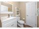 This bathroom features a modern vanity, stylish mirror, and neutral decor at 7164 Conch Blvd, Seminole, FL 33777