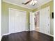 Bedroom with closet and interior view of home at 100 Driftwood W Dr, Palm Harbor, FL 34683