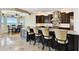 Gorgeous kitchen with stainless steel appliances, granite countertops, and island seating at 100 Driftwood W Dr, Palm Harbor, FL 34683