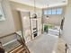 Spacious living room with fireplace, soaring ceilings, and sliding doors to the outdoor patio at 100 Driftwood W Dr, Palm Harbor, FL 34683