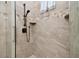 Tile shower with shampoo niches and hand shower at 100 Driftwood W Dr, Palm Harbor, FL 34683