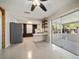 Open concept kitchen boasts stainless steel appliances and seamless transition to outdoor area at 1220 Parkview Ln, Largo, FL 33770