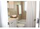Bright bathroom with tiled walls, vanity, and a shower/tub combination at 12400 Park Blvd # 408, Seminole, FL 33772