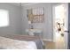 Cozy bedroom featuring an ensuite study area with plenty of natural light at 12400 Park Blvd # 408, Seminole, FL 33772