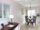 Bright dining area with modern lighting and neutral walls at 12400 Park Blvd # 408, Seminole, FL 33772