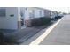 Street view of attractive single-story homes with manicured landscaping and well-maintained sidewalks at 12400 Park Blvd # 408, Seminole, FL 33772