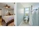 View of the bedroom, toilet and adjacent bathroom at 14910 Northwood Village Ln, Tampa, FL 33613