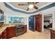 Spacious kitchen with granite counters, modern appliances, and a view to the bedroom at 14910 Northwood Village Ln, Tampa, FL 33613