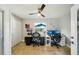 Bright and airy office featuring two workstations and a ceiling fan at 14910 Northwood Village Ln, Tampa, FL 33613