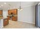 Bright kitchen offering stainless steel appliances, granite countertops, tile backsplash and ample cabinet space at 1503 Yale Castle Ct, Ruskin, FL 33570