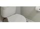Close-up of a white toilet with a visible roll of toilet paper at 1503 Yale Castle Ct, Ruskin, FL 33570