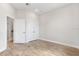 Spacious bedroom features wood-look floors, ample closet space, and neutral paint at 1623 Sea Haven Dr # 307, Punta Gorda, FL 33950