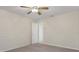 Neutral bedroom with carpet and open door at 17807 Crystal Cove Pl, Lutz, FL 33548