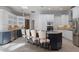 Kitchen featuring granite counters, stainless appliances, breakfast bar seating, and plenty of storage space at 17807 Crystal Cove Pl, Lutz, FL 33548