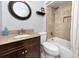 Well-appointed bathroom featuring a bathtub with tile surround and stylish vanity at 1824 Clearbrooke Dr, Clearwater, FL 33760