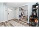 Welcoming foyer with stylish flooring, leading to the staircase and living areas at 1824 Clearbrooke Dr, Clearwater, FL 33760