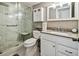 Modern bathroom features a glass-enclosed shower, sleek vanity, and stylish fixtures at 2042 Australia W Way # 6, Clearwater, FL 33763
