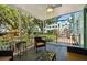 Inviting patio with comfortable seating and a charming view of the surrounding landscape at 2042 Australia W Way # 6, Clearwater, FL 33763