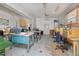 Well-lit workshop with sewing machines and a variety of work tables at 2042 Australia W Way # 6, Clearwater, FL 33763