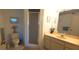 A bathroom featuring a shower, toilet, vanity and neutral decor at 2222 Norwegian Dr # 24, Clearwater, FL 33763