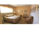 Cozy bedroom showcasing a comfortable bed and natural light at 2222 Norwegian Dr # 24, Clearwater, FL 33763