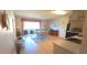 Open-concept living space featuring dining and kitchen areas with tiled flooring at 2222 Norwegian Dr # 24, Clearwater, FL 33763