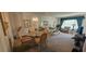 Inviting living room with combined dining area, natural light, and comfortable seating at 2222 Norwegian Dr # 24, Clearwater, FL 33763