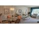 Welcoming living and dining area featuring carpet flooring and a relaxing atmosphere at 2222 Norwegian Dr # 24, Clearwater, FL 33763