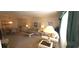 Inviting living room with plush seating, bright natural light, and a cozy dining area at 2222 Norwegian Dr # 24, Clearwater, FL 33763