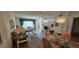 Bright and spacious living and dining area offering comfortable seating and natural light at 2222 Norwegian Dr # 24, Clearwater, FL 33763