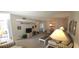 Spacious living area featuring neutral carpet, comfortable seating, and dining area at 2222 Norwegian Dr # 24, Clearwater, FL 33763