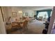 Open-concept living and dining area filled with natural light, perfect for entertaining at 2222 Norwegian Dr # 24, Clearwater, FL 33763