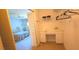 Large walk-in closet with white shelving and storage, connected to the main bedroom at 2222 Norwegian Dr # 24, Clearwater, FL 33763