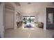 Bright living room featuring a marble tile floor, recessed lighting, and an open floor plan at 2233 Golf Manor Blvd, Valrico, FL 33596