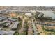Aerial view of community showcasing lush landscaping, pool, and convenient parking at 238 Sun Ketch Ct # 95, Treasure Island, FL 33706