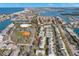 Stunning aerial view of the community, nestled along the waterfront with easy access to the beach and recreational facilities at 238 Sun Ketch Ct # 95, Treasure Island, FL 33706