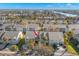 Panoramic aerial view showcases the property with mature landscaping, paired garages, and neighboring waterfront community at 238 Sun Ketch Ct # 95, Treasure Island, FL 33706