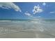 Beautiful beach view with gentle ocean waves and bright sunny skies at 238 Sun Ketch Ct # 95, Treasure Island, FL 33706