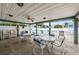Patio with comfortable seating and view of the community pool at 238 Sun Ketch Ct # 95, Treasure Island, FL 33706
