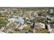 Neighborhood showcasing cozy homes with mature trees, a serene environment, and community feel at 2451 Baywood W Dr, Dunedin, FL 34698
