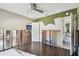 Bedroom with hardwood floors and doors undergoing repairs at 2451 Baywood W Dr, Dunedin, FL 34698