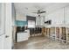 View of a kitchen featuring cabinetry and flooring at 2451 Baywood W Dr, Dunedin, FL 34698