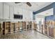View of a kitchen featuring cabinetry and view to the living room at 2451 Baywood W Dr, Dunedin, FL 34698